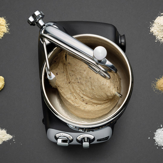 a mixer with a dough in it