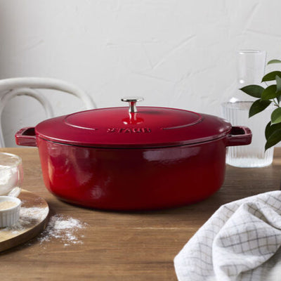 Staub Cast Iron Wide Oval Dutch Oven, 6.25-qt, Cherry - Kitchen Universe