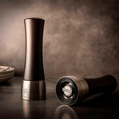 a salt and pepper grinder on a table